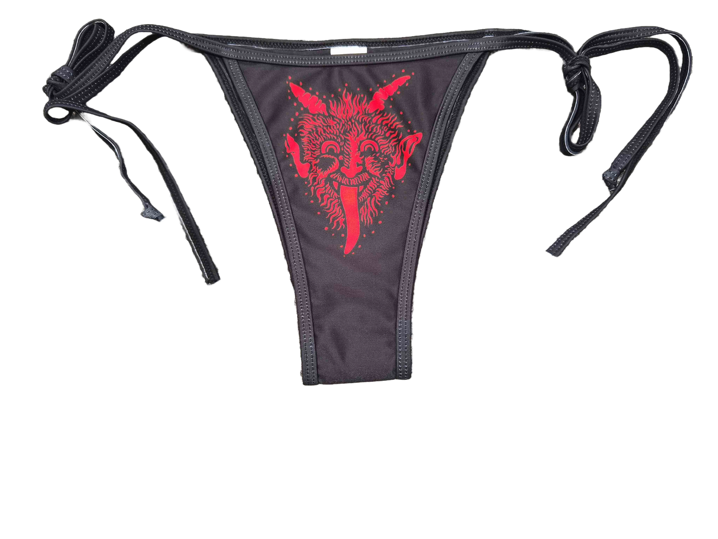 Black bikini bottom that features a red snarling Krampus face.