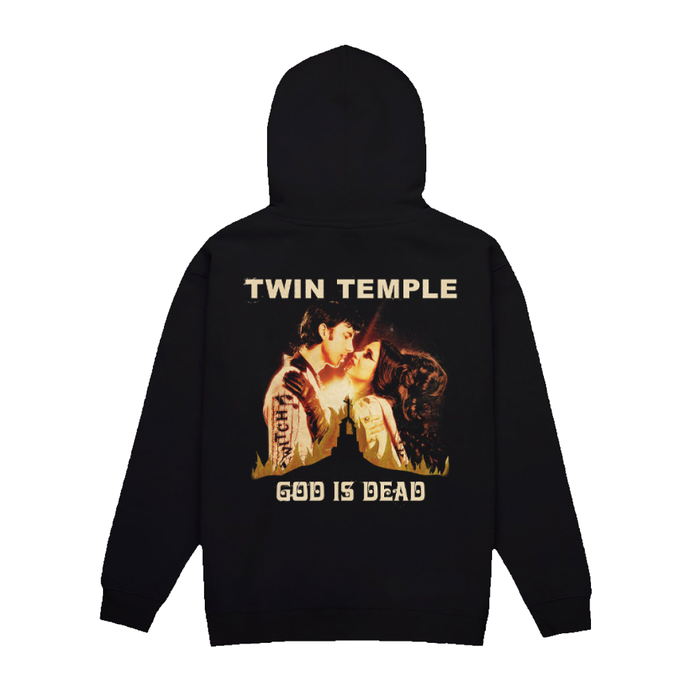 Back black hoodie that features "TWIN TEMPLE" at the top, a large graphic of a couple kissing passionately surrounded by flames, and "GOD IS DEAD" in gold below the graphic.