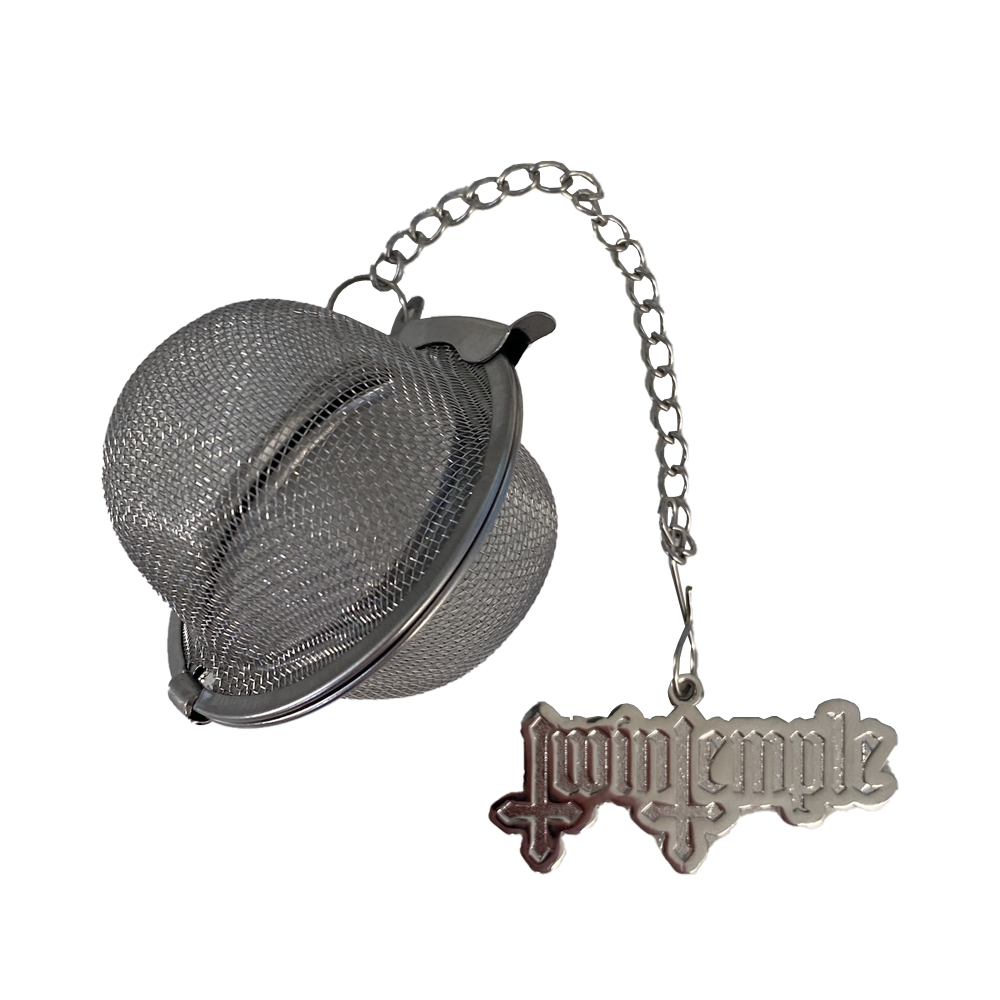 A clear, plastic tea strainer with a mesh body and a handle in the shape of the Twin Temple logo.